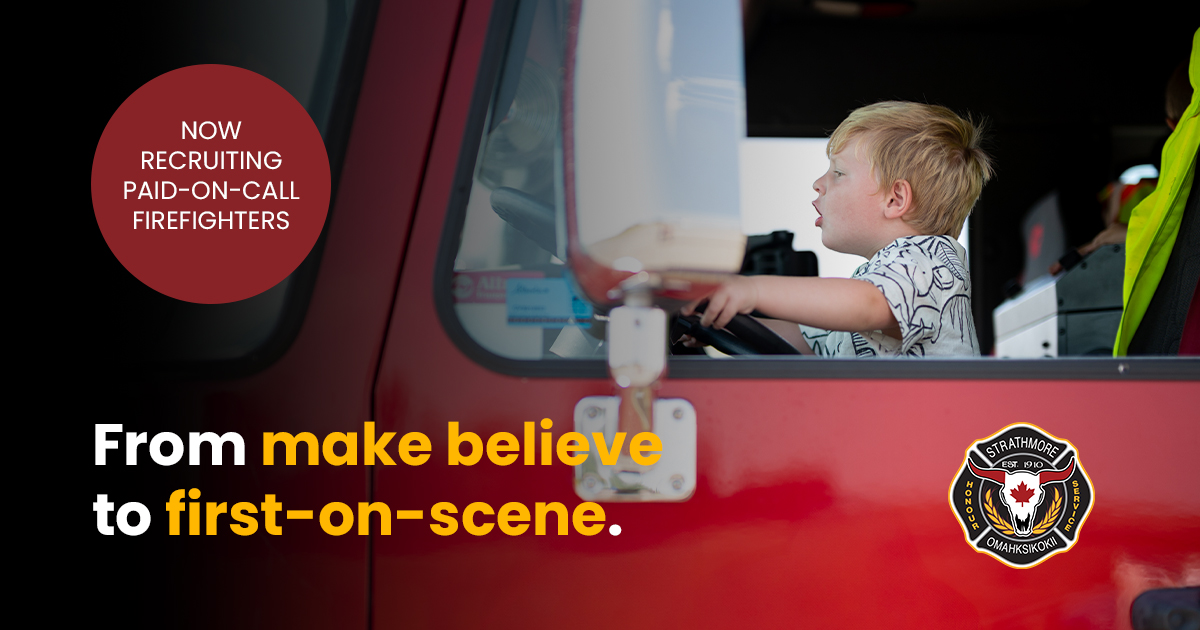 Boy in a firetruck