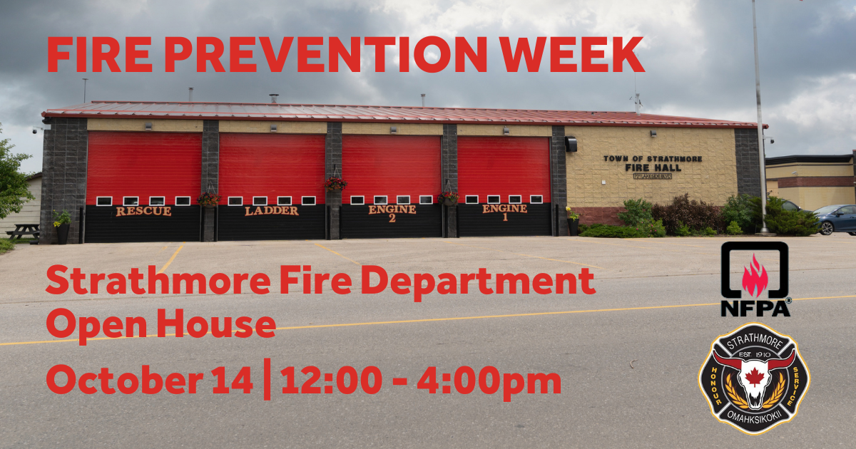 picture of the Strathmore Fire department bay doors. Text overlay: Fire Prevention Week. Strathmore Fire Department Open house October 14 from 12:00 - 4:00pm